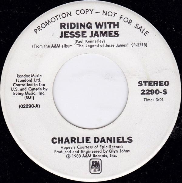Charlie Daniels, Emmylou Harris - Riding With Jesse James / Wish We Were Back In Missouri
