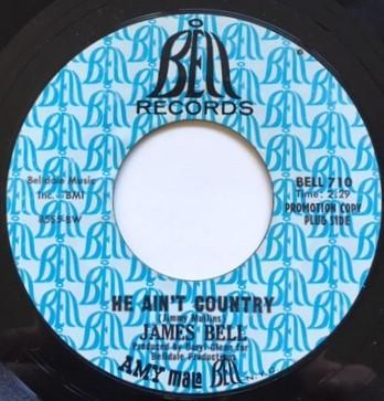 James Bell (6) - He Ain't Country / A Friendly Place To Cry